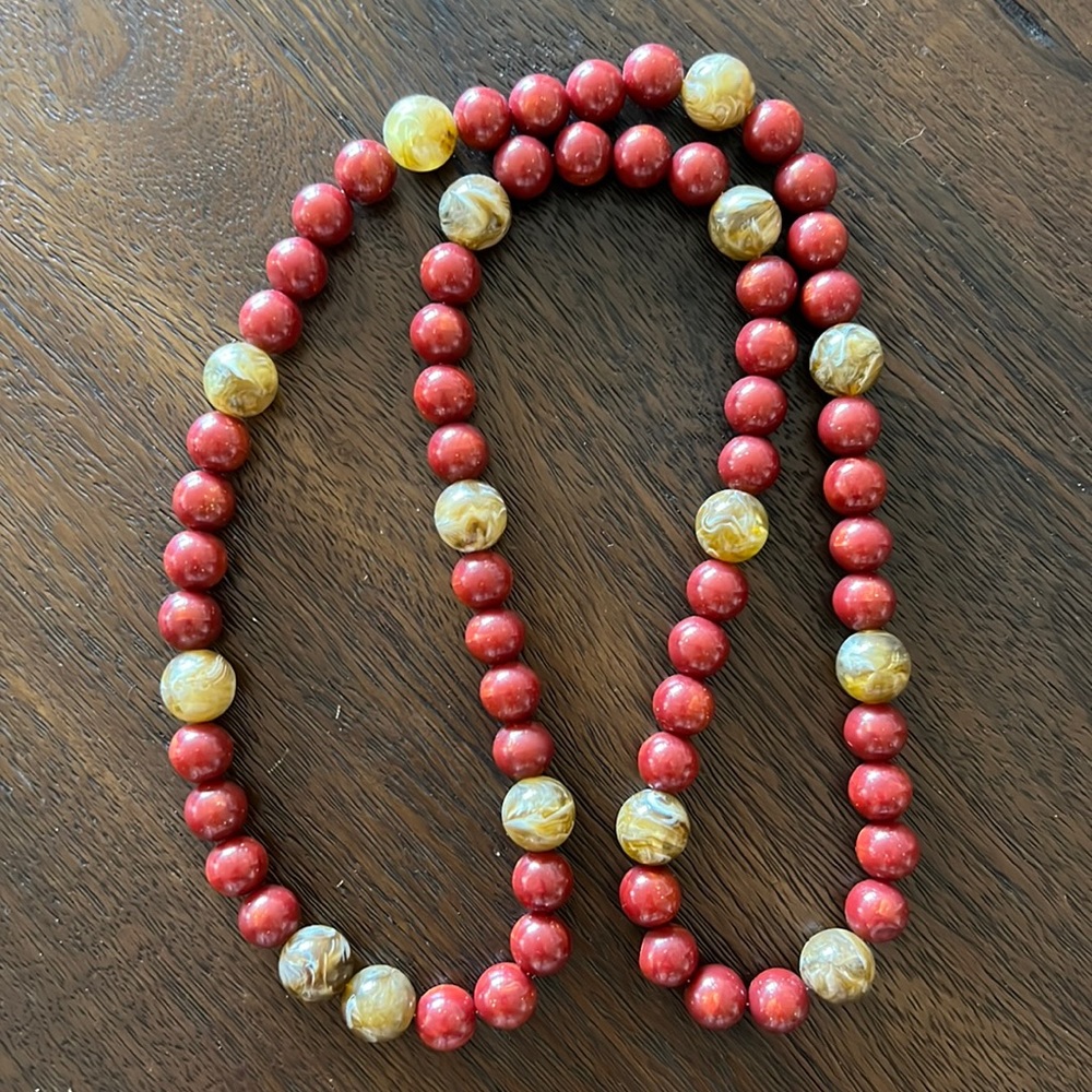 Chunky beaded red and brown necklace.